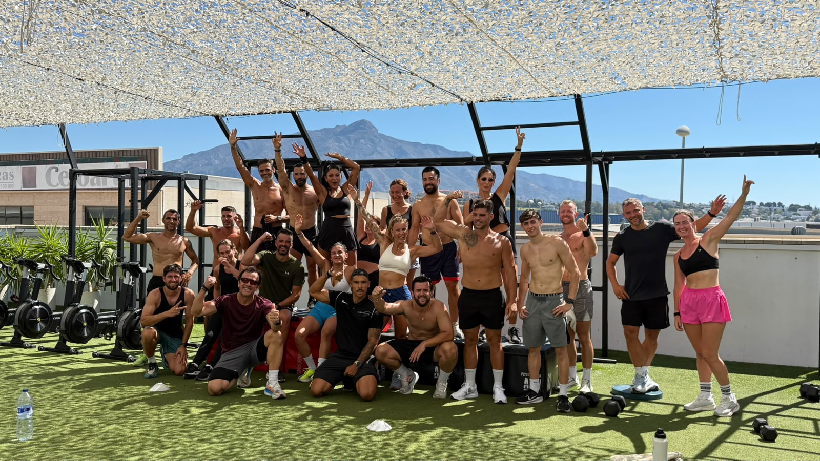 Elements Gym members after a rooftop group training session in Marbella