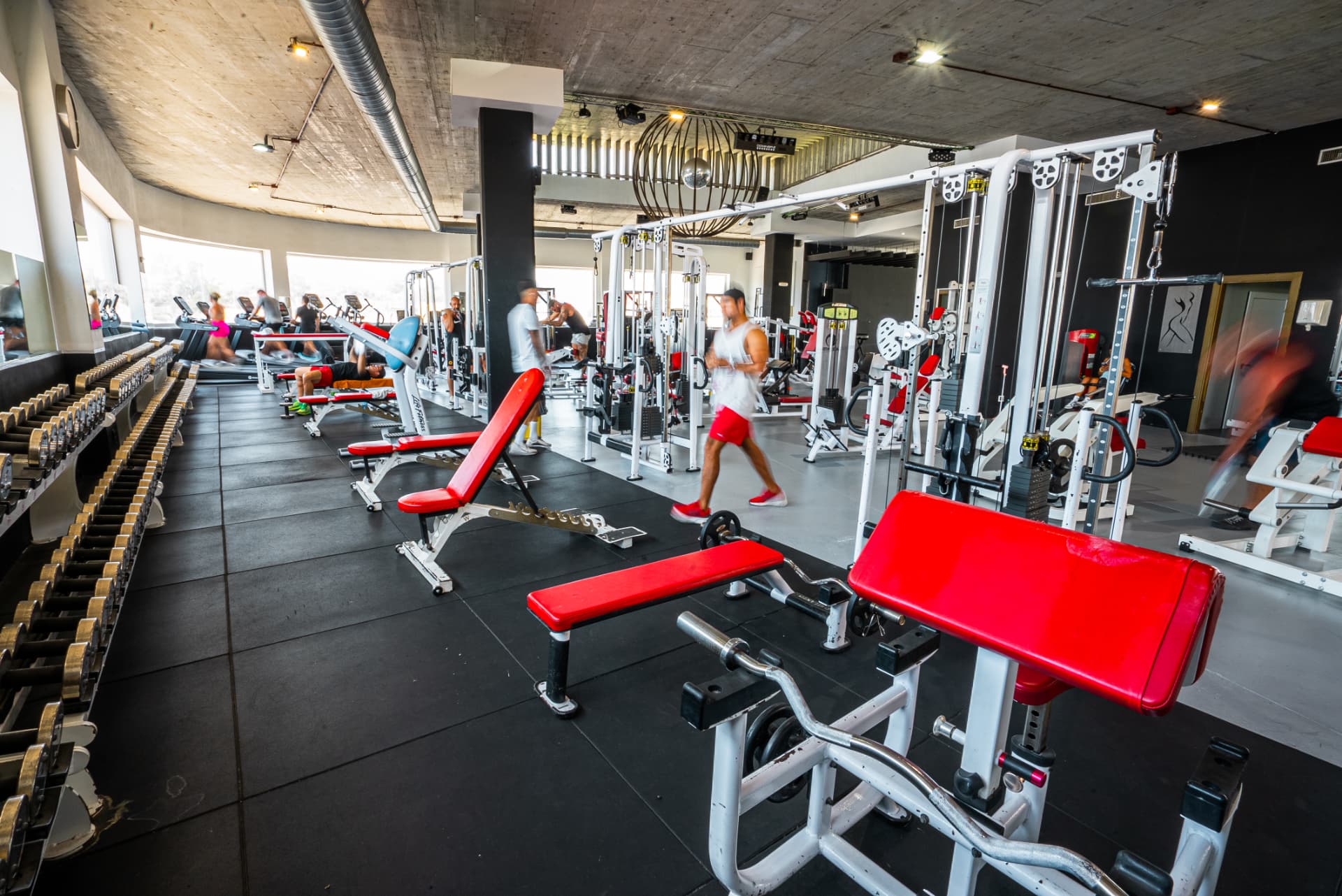 Members training across the main gym floor at Elements Marbella